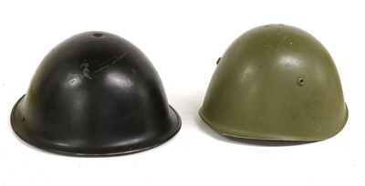 Lot 179 - Two Second World War Brodie Helmets, one with...