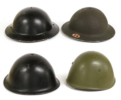 Lot 179 - Two Second World War Brodie Helmets, one with...