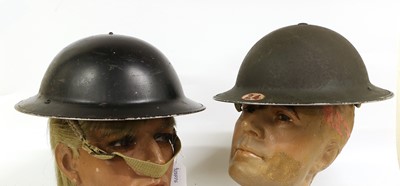 Lot 179 - Two Second World War Brodie Helmets, one with...
