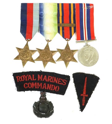 Lot 93 - A Second World War Economy Bakelite Cap Badge...