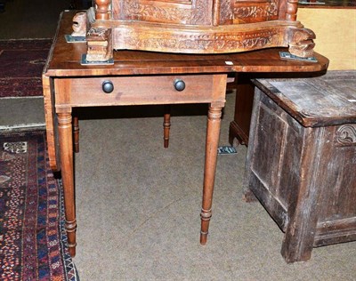 Lot 684 - A George III Sheraton style mahogany Pembroke table