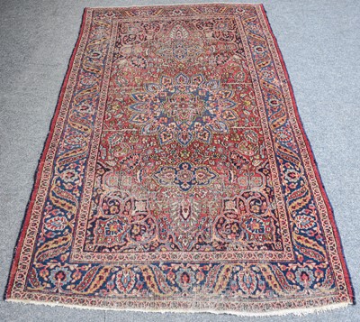 Lot 1017 - Mashad Rug, the raspberry field centred by a...