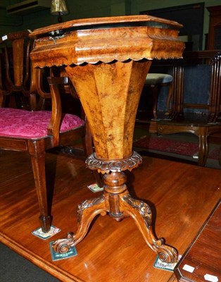 Lot 691 - A Victorian burr walnut sewing table