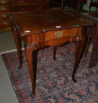 Lot 699 - A mahogany side table with shaped top and end drawer