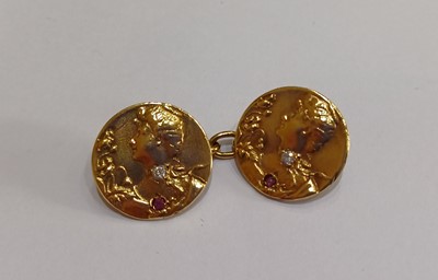 Lot 2138 - A Pair of Diamond and Synthetic Ruby Cufflinks...