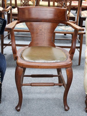 Lot 1283 - An Oak Desk Chair, with studded leather seat back