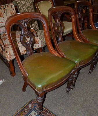 Lot 716 - Four Victorian mahogany buckle back dining chairs