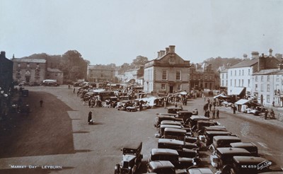 Lot 270 - Postcards Featuring Cars. An album of...