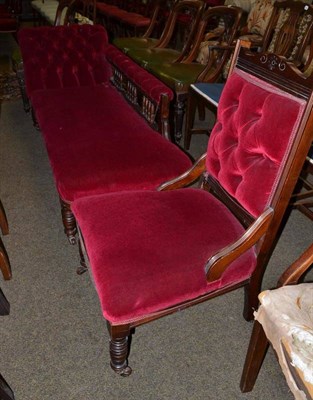 Lot 717 - A chaise longue and matching chair, upholstered in crimson velour