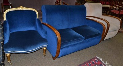 Lot 722 - An Art Deco two seater sofa and a matching armchair; and an easy chair (3)