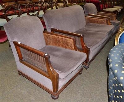 Lot 724 - A three piece bergere suite with single cane arm panels