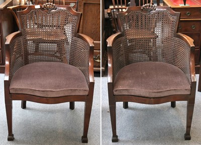 Lot 1256 - A Pair of 1920s Caned Armchairs, with foliate...