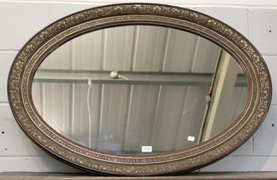 Lot 1226 - A Rosewood Framed Parcel Gilt Oval Mirror,...