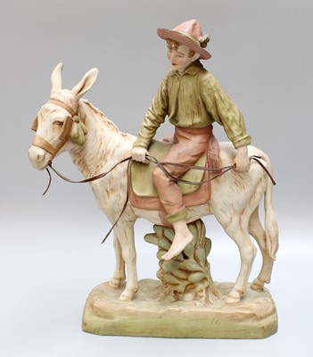 Lot 183 - A Royal Dux Porcelain Figure, of a boy riding...