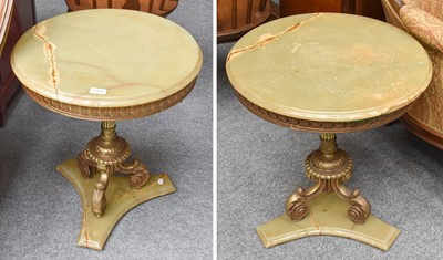 Lot 1366 - A Pair of Gilt Metal Onyx Top Circular Tables,...