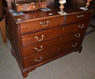 Lot 742 - A George III mahogany low four height chest of drawers