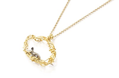 Lot 365 - An 18 Carat Gold and Silver Mouse Pendant on...