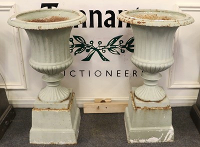 Lot 1427 - A Pair of Painted Cast Iron Garden Urns, of...