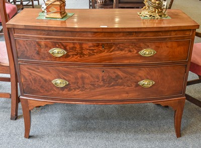 Lot 1177 - A Georgian Mahogany Bow Front Two Drawer Chest,...