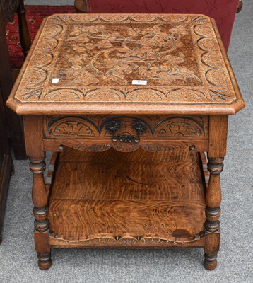 Lot 1192 - A 20th Century Carved Oak Two Tier Lamp Table,...