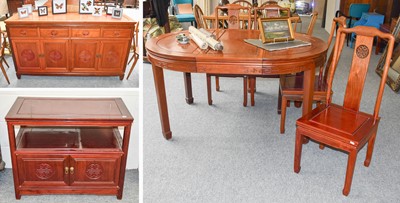 Lot 1474 - A 20th Century Chinese Hardwood Dining Suite...