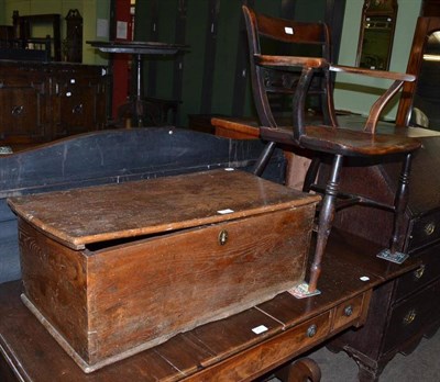 Lot 750 - A country elbow chair and an oak chest