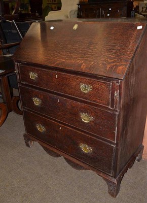 Lot 752 - A Georgian oak bureau