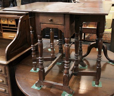 Lot 1240 - An Early 19th Century Provincial Oak Drop Leaf...