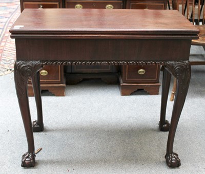 Lot 1399 - A 19th Century Mahogany Fold Over Tea Table,...