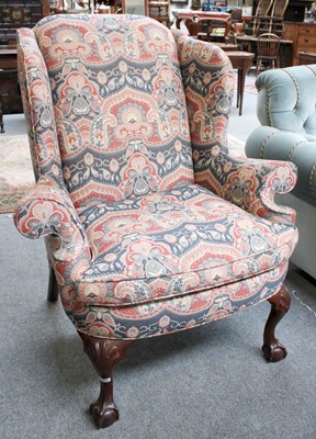 Lot 1331 - A Georgian Style Wingback Armchair, Paisley...