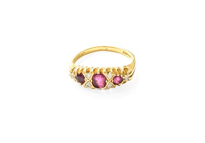 Lot 390 - An 18 Carat Gold Ruby and Diamond Ring, the...