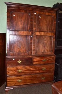 Lot 770 - A George III mahogany linen press