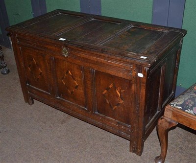 Lot 778 - A 17th century oak coffer with inlaid decoration