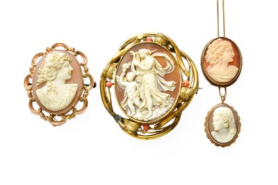 Lot 345 - A Cameo Brooch, in a scroll frame set with...