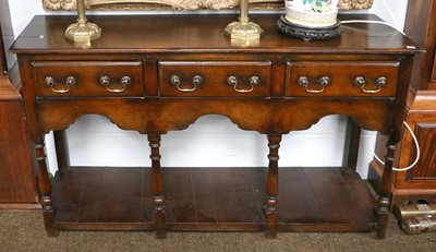 Lot 1493 - An 18th Century Style Oak Low Dresser, three...