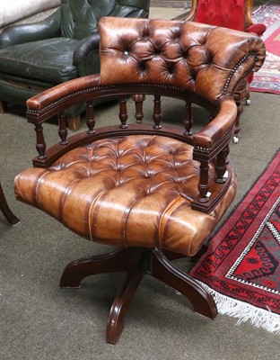 Lot 1346 - A Brown Leather & Mahogany Office Swivel Chair,...