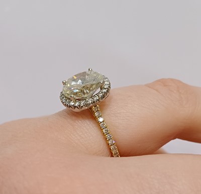 Lot 2316 - A Diamond Cluster Ring the round brilliant cut...