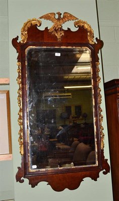 Lot 793 - A Georgian style fret carved wall mirror