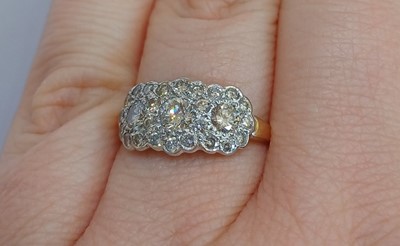 Lot 2155 - A Diamond Triple Cluster Ring three round...