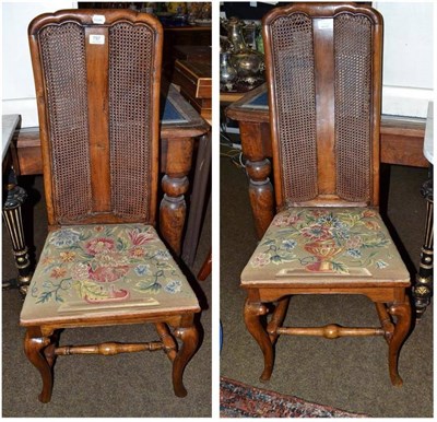 Lot 797 - Pair of 18th century style walnut side chairs with caned back and petit point seat covers