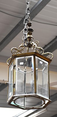 Lot 1395 - A Hexagonal Brass and Glass Panelled Hanging...