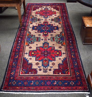 Lot 1096 - Hamadan Rug, the camel ground with three...