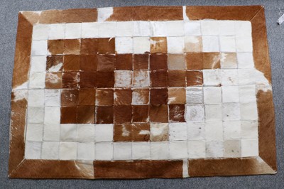 Lot 1108 - Goatskin Rug, the compartmentalised polychrome...