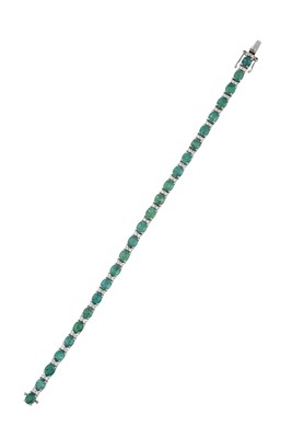 Lot 2310 - An Emerald and Diamond Bracelet the...