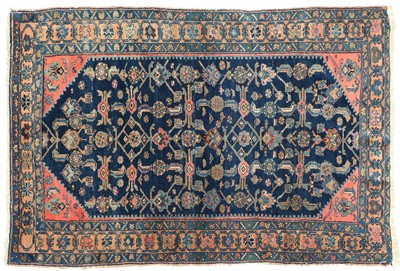 Lot 597 - Malayer Rug West Iran, circa 1930 The indigo...