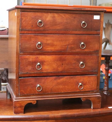 Lot 1302 - A Georgian Mahogany Four Height Chest of...