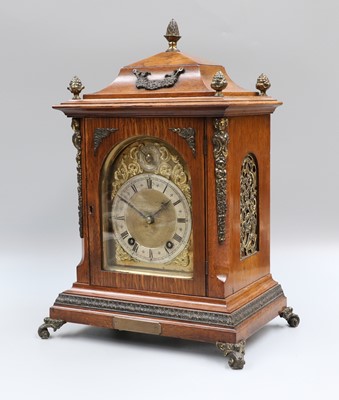 Lot 204 - An Oak Quarter Striking Table Clock, with gilt...