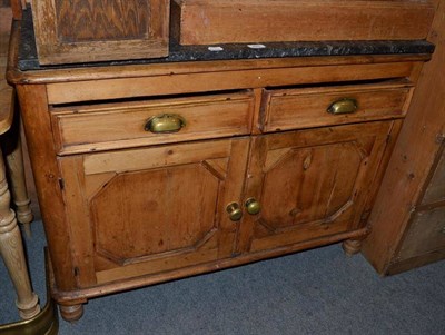 Lot 845 - A Victorian pine dresser with later rack and marble top