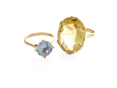 Lot 524 - A Citrine Ring, the oval cut citrine, in a...