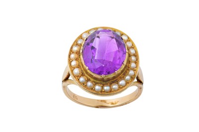 Lot 2159 - An Amethyst and Split Pearl Ring the oval cut...